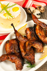 Roasted quail in tomato sauce