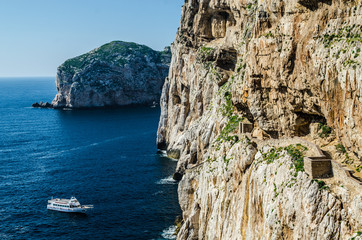 Yacht and Stairways in Capo Caccia, Sardinia, Italy