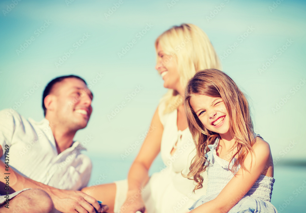 Wall mural happy family having a picnic