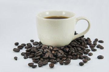 Coffee cup and beans