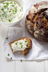 Breakfast including cottage cheese, bread and milk