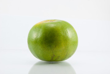 Ripe orange on white background