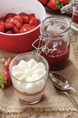 Layer strawberry dessert with whipped cream topping