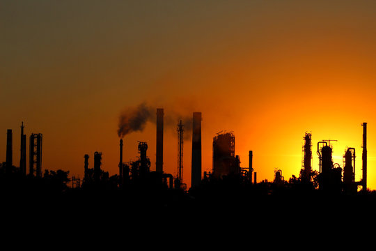 View of crude oil refinery during sunset