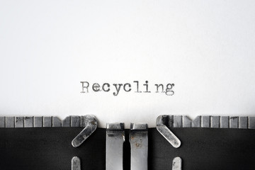 "Recycling" written on an old typewriter