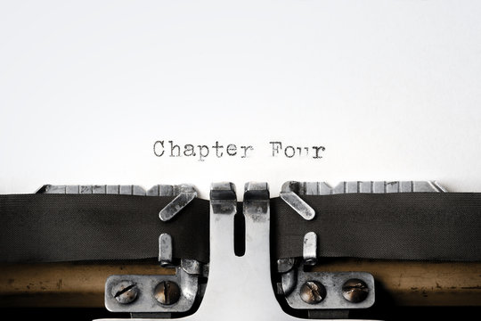 "Chapter Four" written on an old typewriter