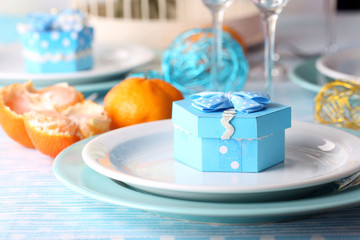 Table serving with colorful tableware close-up