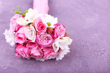 Beautiful wedding bouquet on wooden background