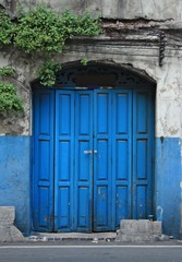 blue door in old building