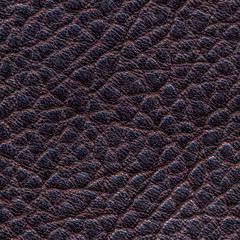 dark brown leather texture closeup.