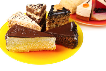 Assortment of pieces of cake, isolated on white © Africa Studio