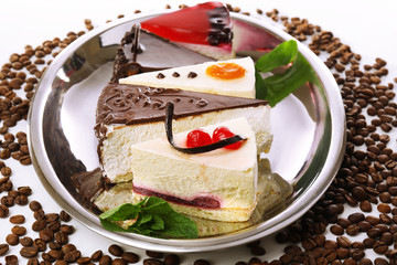Assortment of pieces of cake, close up © Africa Studio