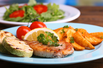 Grilled steak, grilled vegetables and fresh green salad