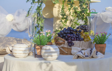 Beautifully served table on the sea shore.