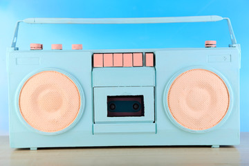 Colorful retro radio, on blue background