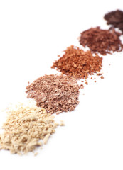 Crushed eyeshadow isolated on white