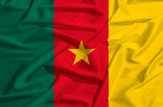 Cameroun flag on a silk drape waving