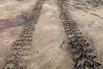 Caterpillar tracks traces on the ground