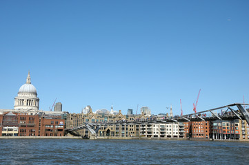 Fototapeta premium London skyline across River Thames at Millennium Bridge