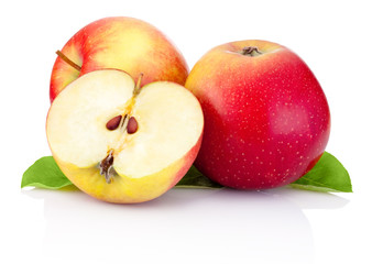 Two red apples and half with green leaves isolated on a white ba