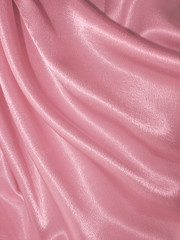 Draped pink silk background