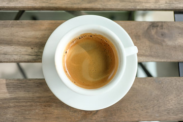 Coffee cup on wooden table