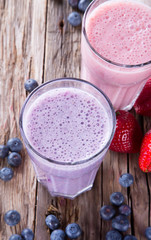 Fresh milk shake on wood