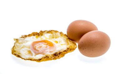 Thai styel deep fried eggs on a white background