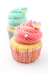 Vanilla cupcakes isolated white background
