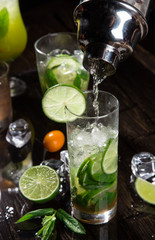 Pouring a cocktail into glass