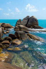Fototapeta na wymiar Rocky coastline on Samui Island
