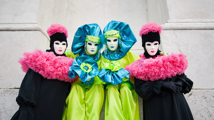 Fototapeta na wymiar Carnival of Venice, beautiful masks at St. George island.
