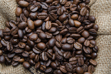 Coffee beans in a burlap bag