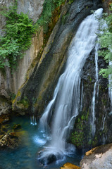 Fototapeta na wymiar Waterfall at the Ulukaya canyon