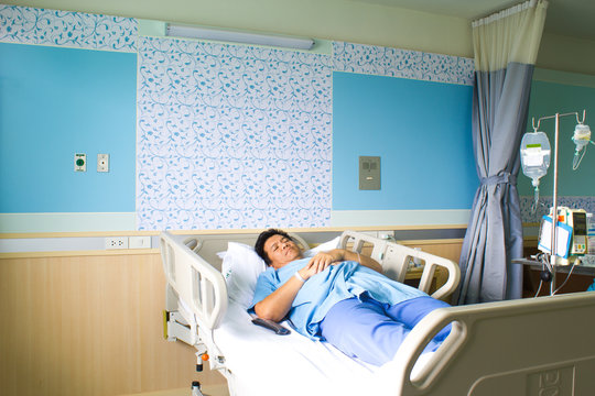 Patient In Hospital Bed