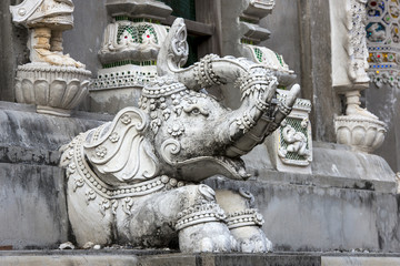 Fototapeta na wymiar elephant statue around pagoda at temple