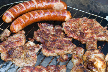 barbecue with delicious grilled meat on grill