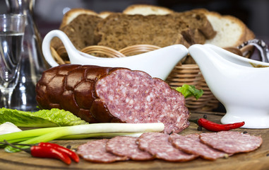 sausage on a wooden plate in a restaurant