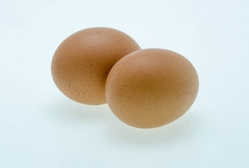 two eggs are isolated on a white background