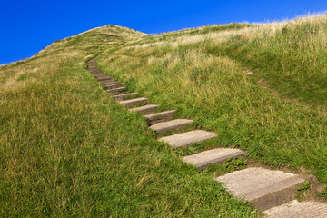 Blue sky and the green hill from Glastonbury Tor, UK © Fulcanelli
