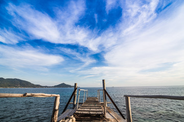 Fototapeta premium Wooden walkway over the sand dunes to the beach