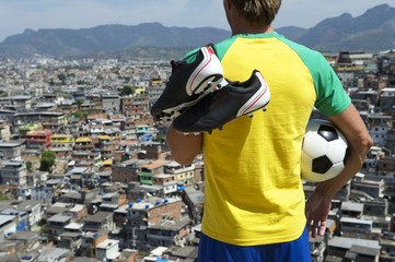 Brazilian Football Player in Kit Holding Soccer Ball Favela