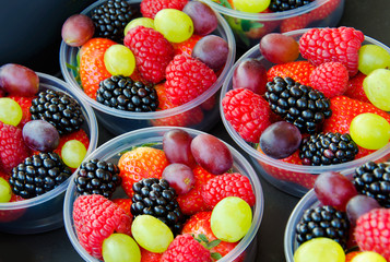 cups of colorful fruit