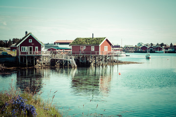 Fototapeta premium Typical Norwegian fishing village with traditional red rorbu hut