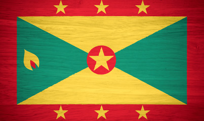 Fototapeta premium Grenada flag on wood texture