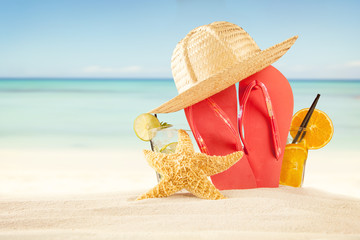 Summer beach with drinks and accessories
