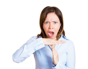 Middle aged angry woman showing time out hand gesture 