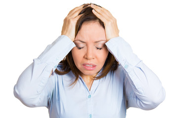 Stressed, overwhelmed woman having bad headache