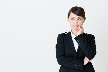 asian businesswoman thinking on white background