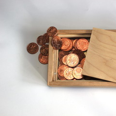 Wooden box with european coins